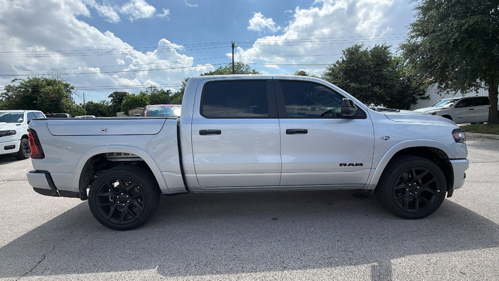 New 2026 Silver Zynith Exterior Paint RAM Laramie image 4