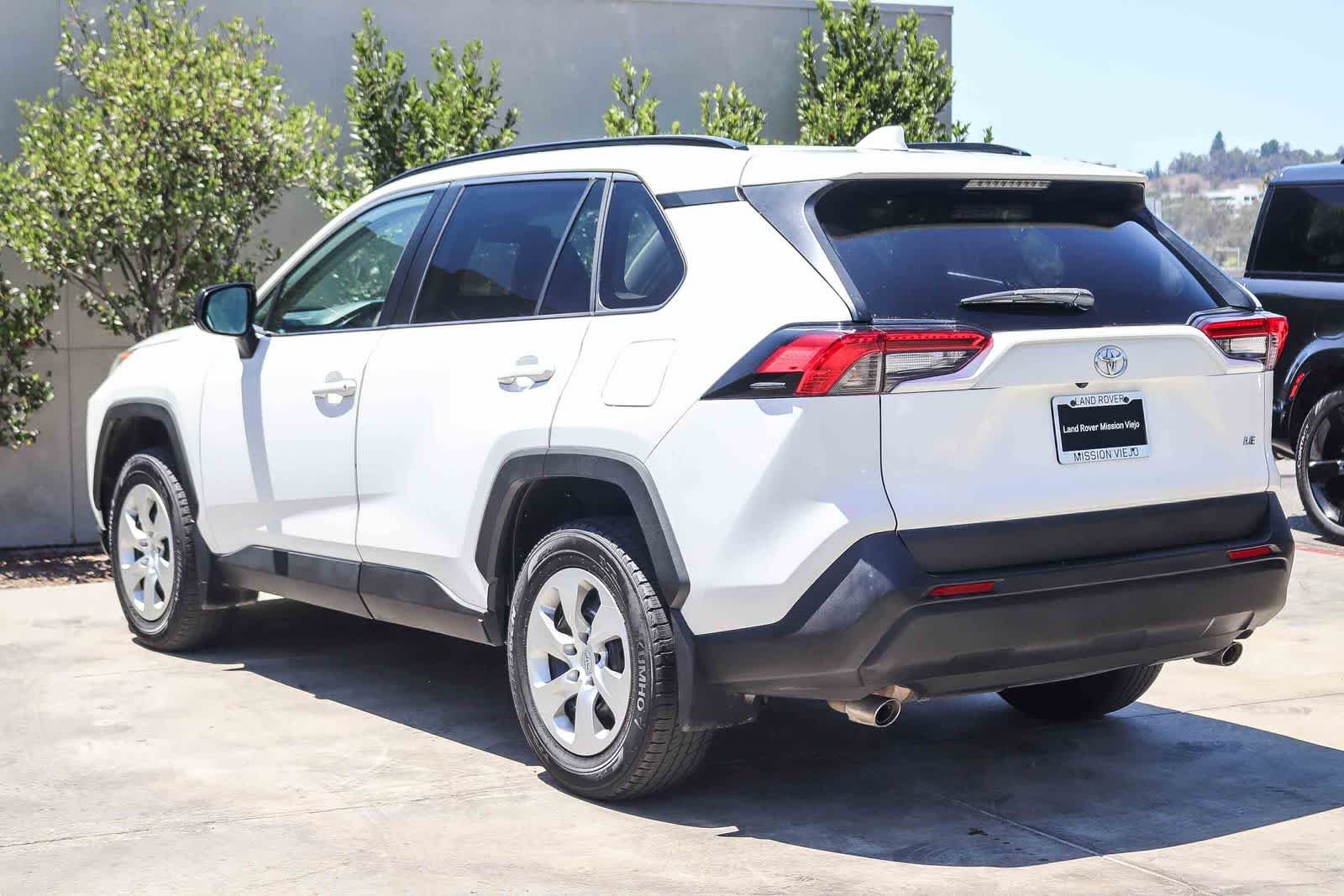 Used 2021 Super White Toyota LE image 4