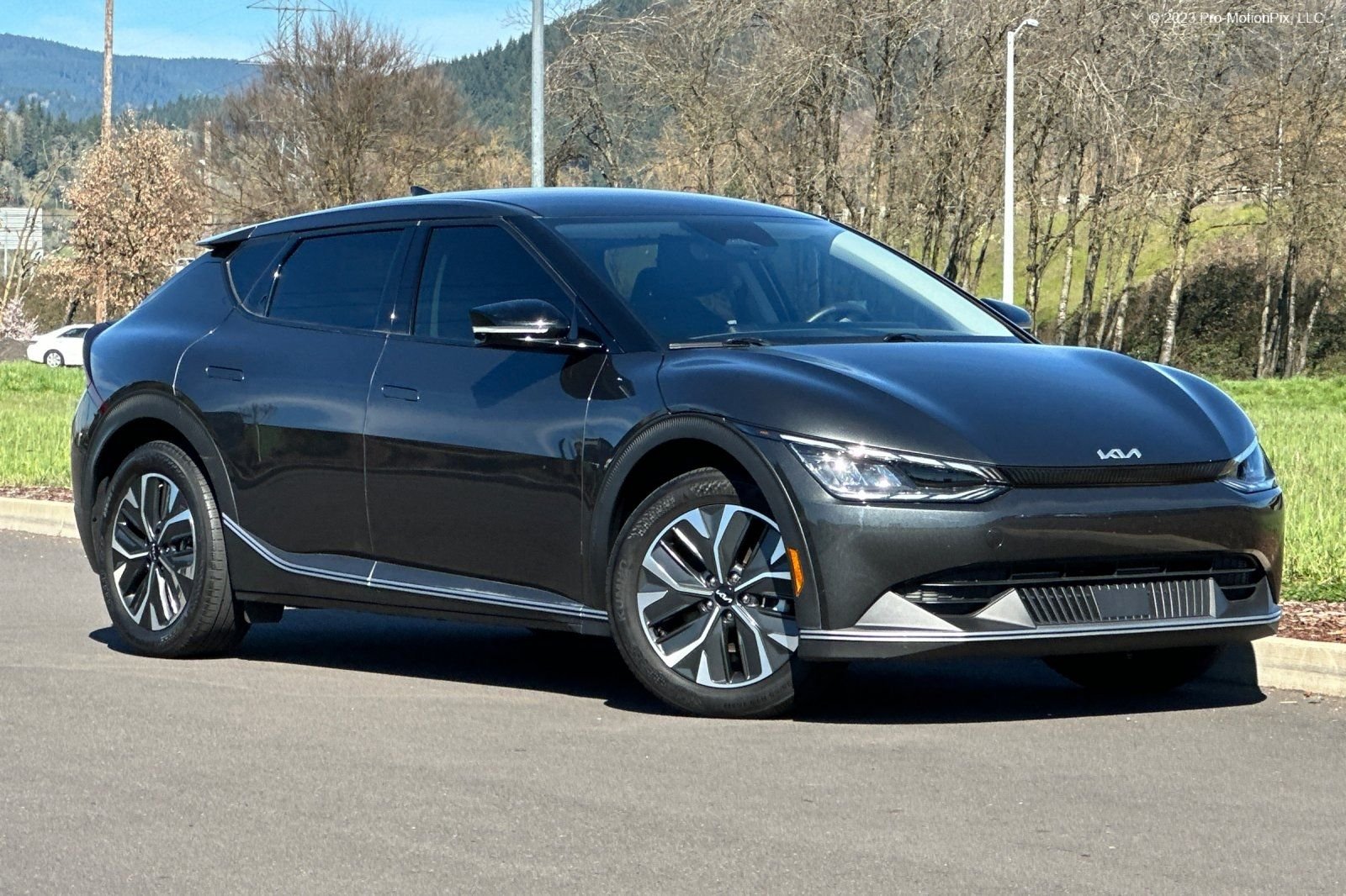 Used 2023 Gray Kia Light image 1