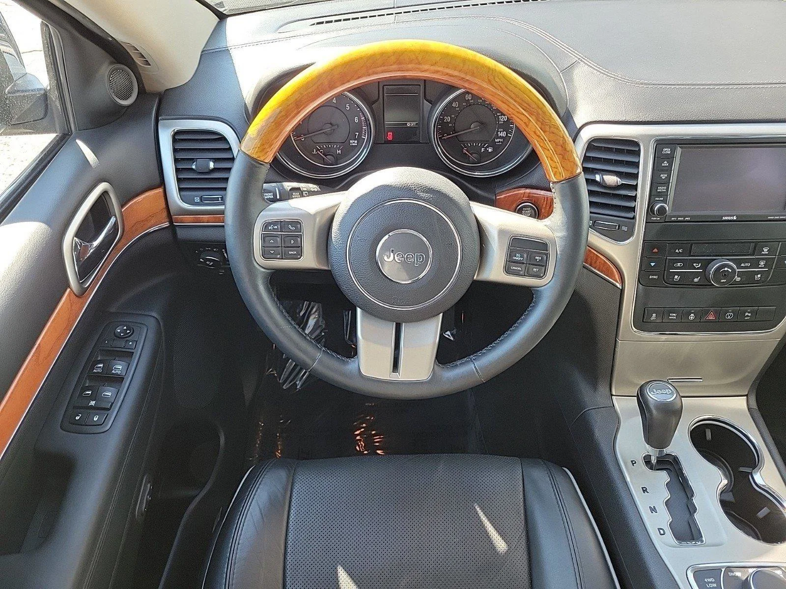 Used 2013 Brilliant Black Crystal Pearl Jeep Overland image 18