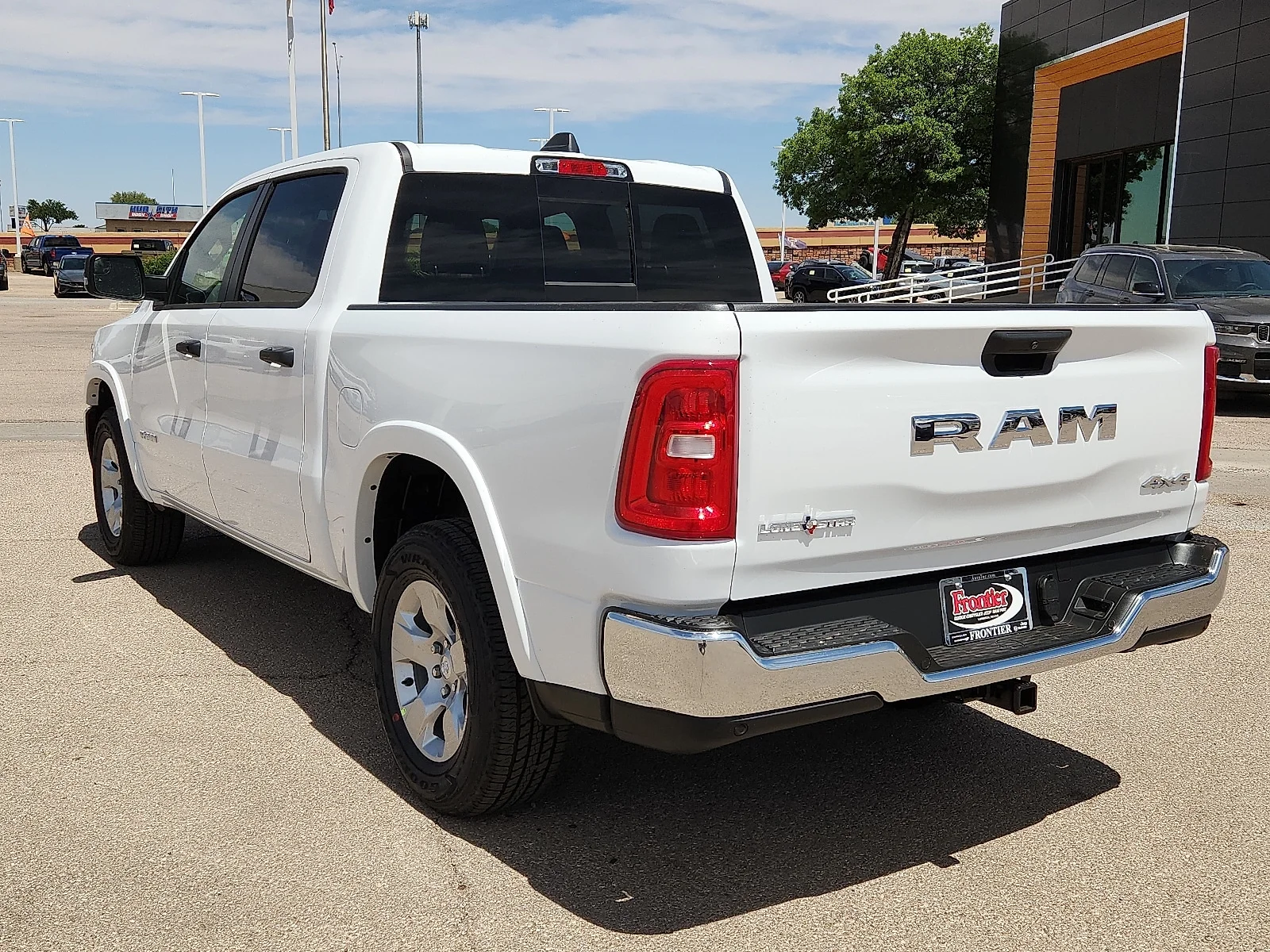 New 2026 Bright White Clearcoat Ram LONE STAR CREW CAB 4X4 5