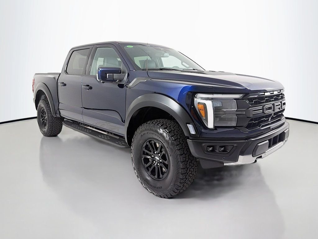 Used 2024 Antimatter Blue Metallic Ford Raptor 4WD SuperCrew 5.5