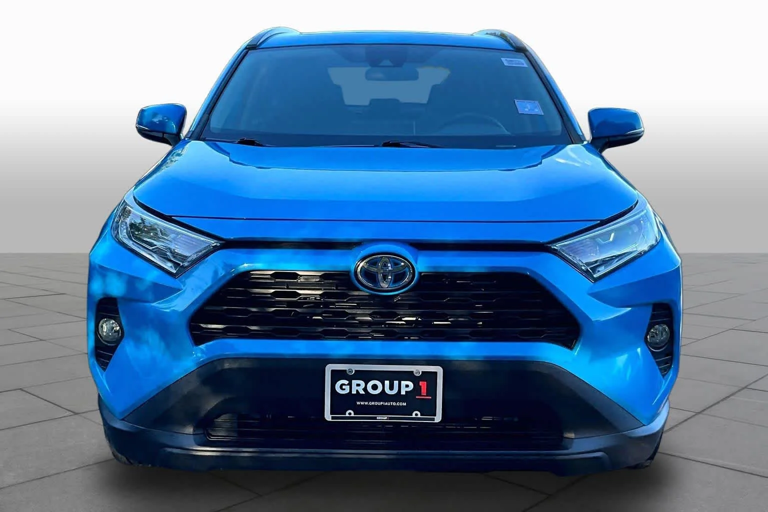Used 2021 Blue Flame Toyota Hybrid XLE image 4