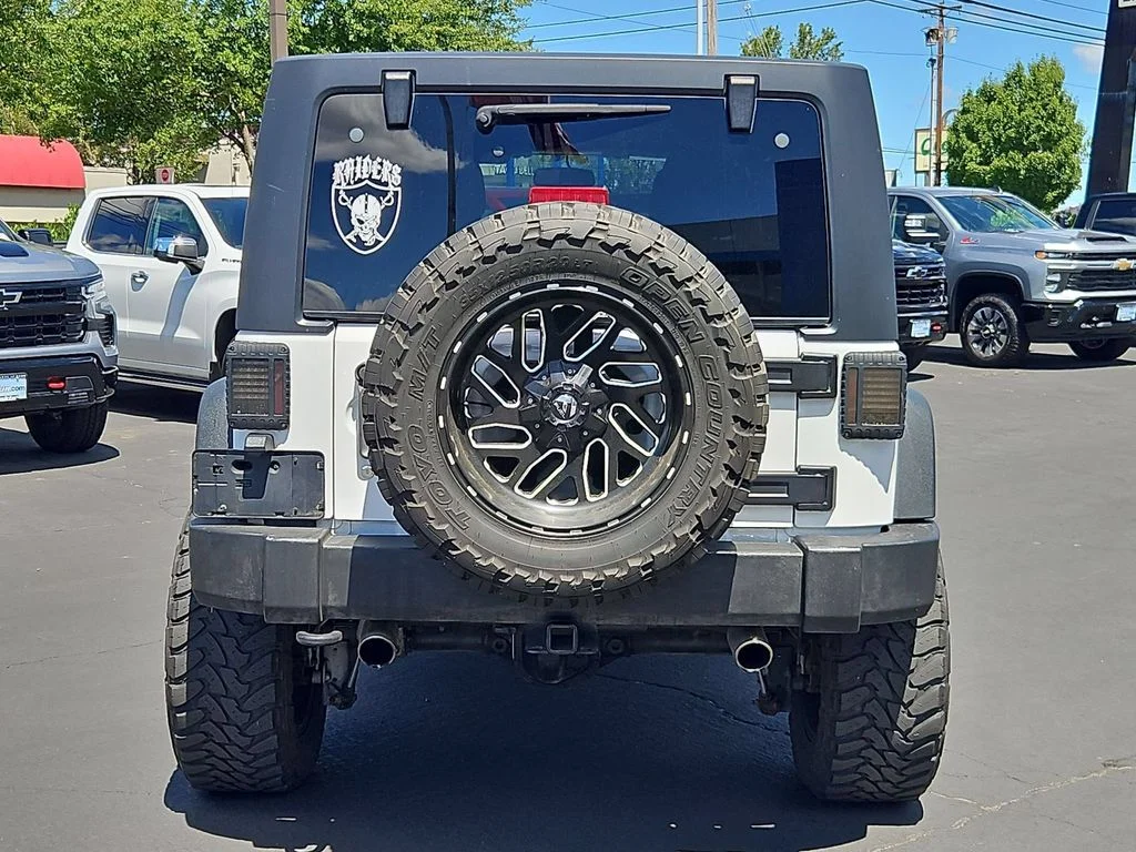 Used 2018 Granite Crystal Metallic Clearcoat Jeep Unlimited Rubicon image 5