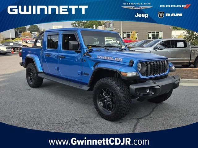 Used 2024 Blue Jeep Sport image 1