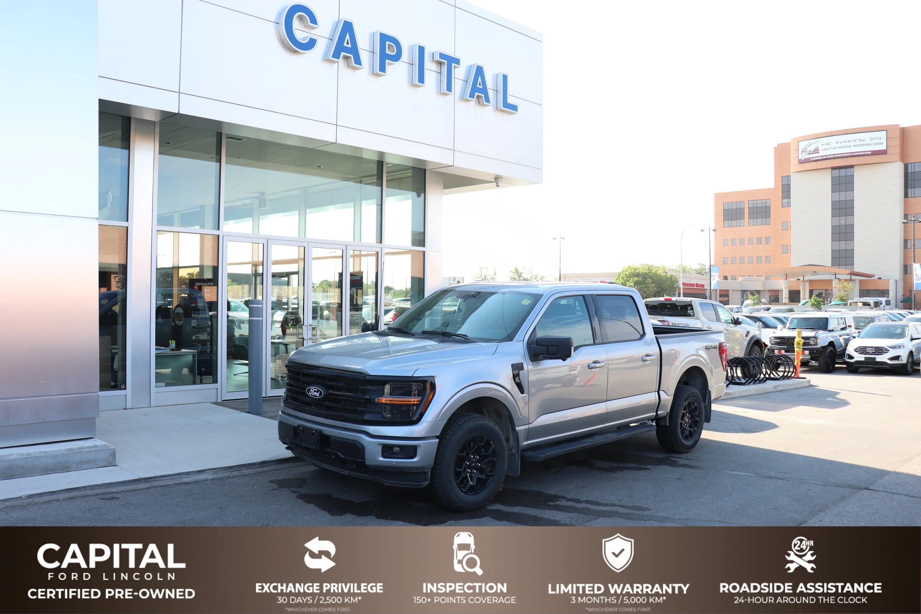 Used 2024 Silver Ford XLT 4WD SuperCrew 5.5