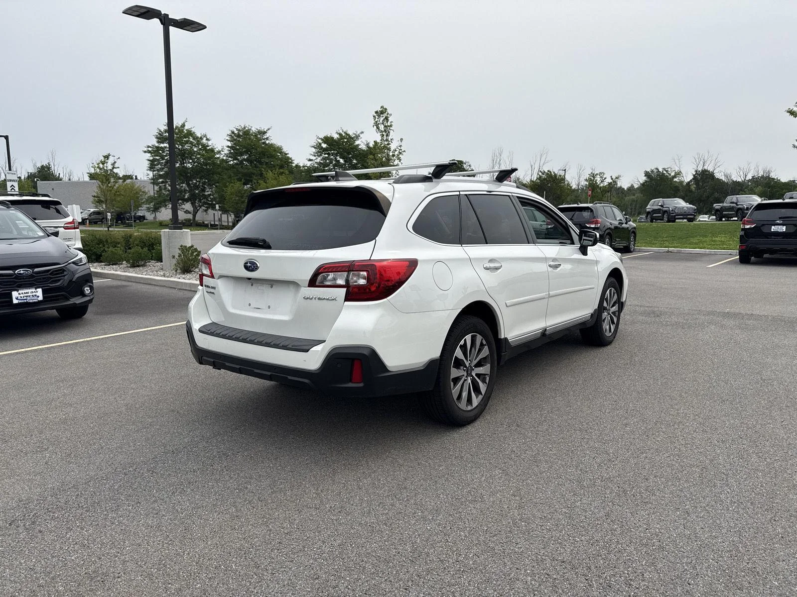 Used 2019 Crystal White Pearl Subaru Touring image 4