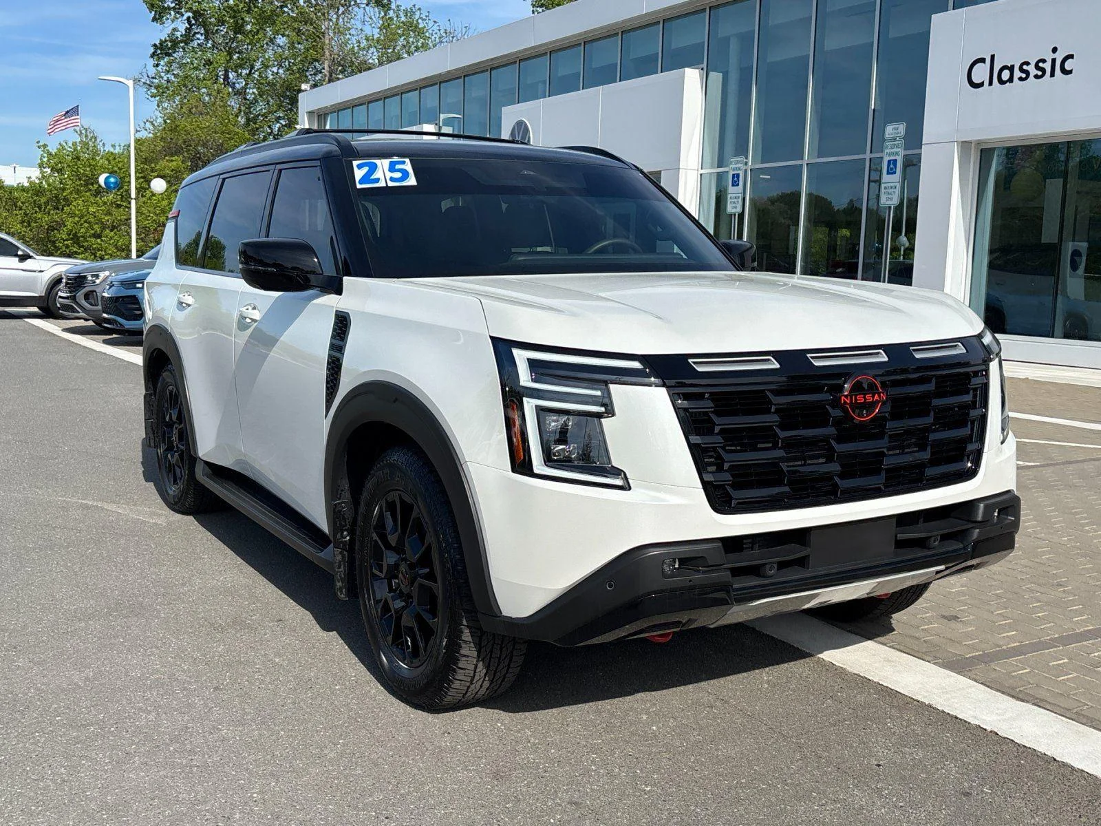 Used 2025 Aspen White Tricoat/Super Black Nissan PRO-4X image 7