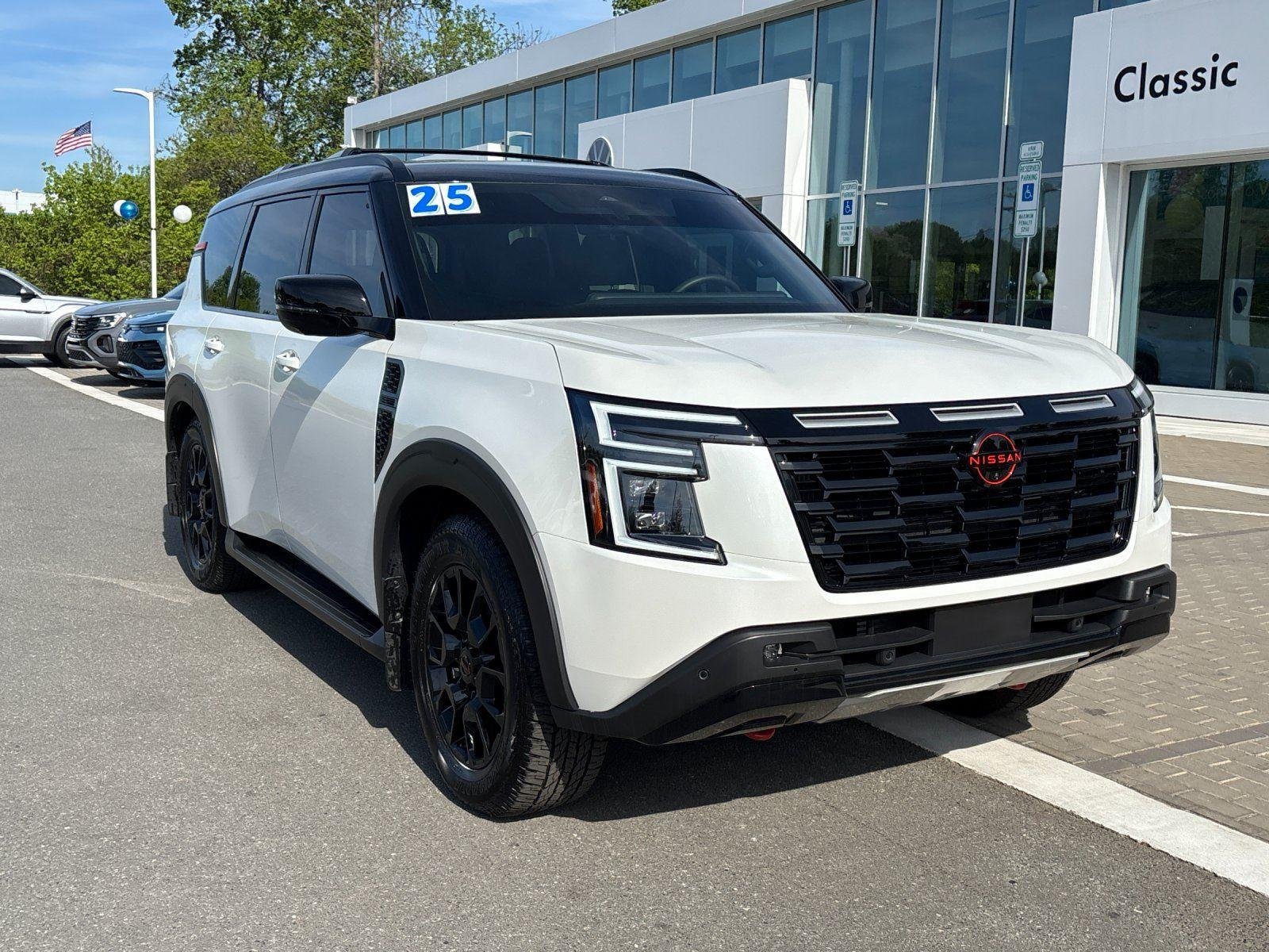 Used 2025 Aspen White Tricoat/Super Black Nissan PRO-4X image 7