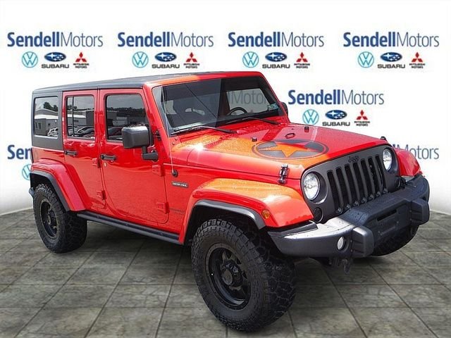 Used 2018 Red Jeep Unlimited Sport image 1