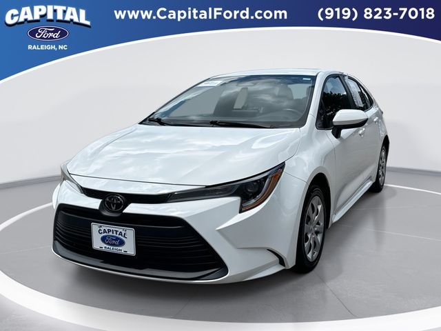 Used 2024 White Toyota LE image 1