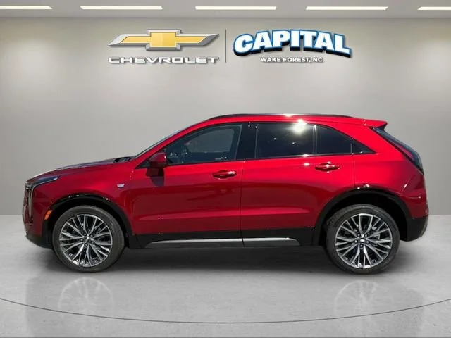 Used 2024 Radiant Red Tintcoat Cadillac Sport image 2