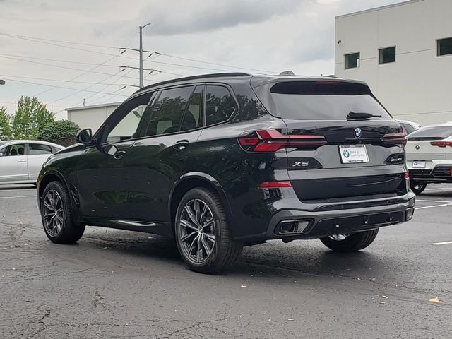 New 2026 Black Sapphire Metallic BMW xDrive40i image 3