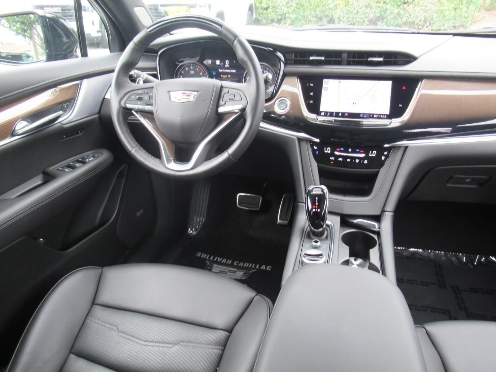 Certified Used 2025 Stellar Black Metallic Cadillac Sport image 14