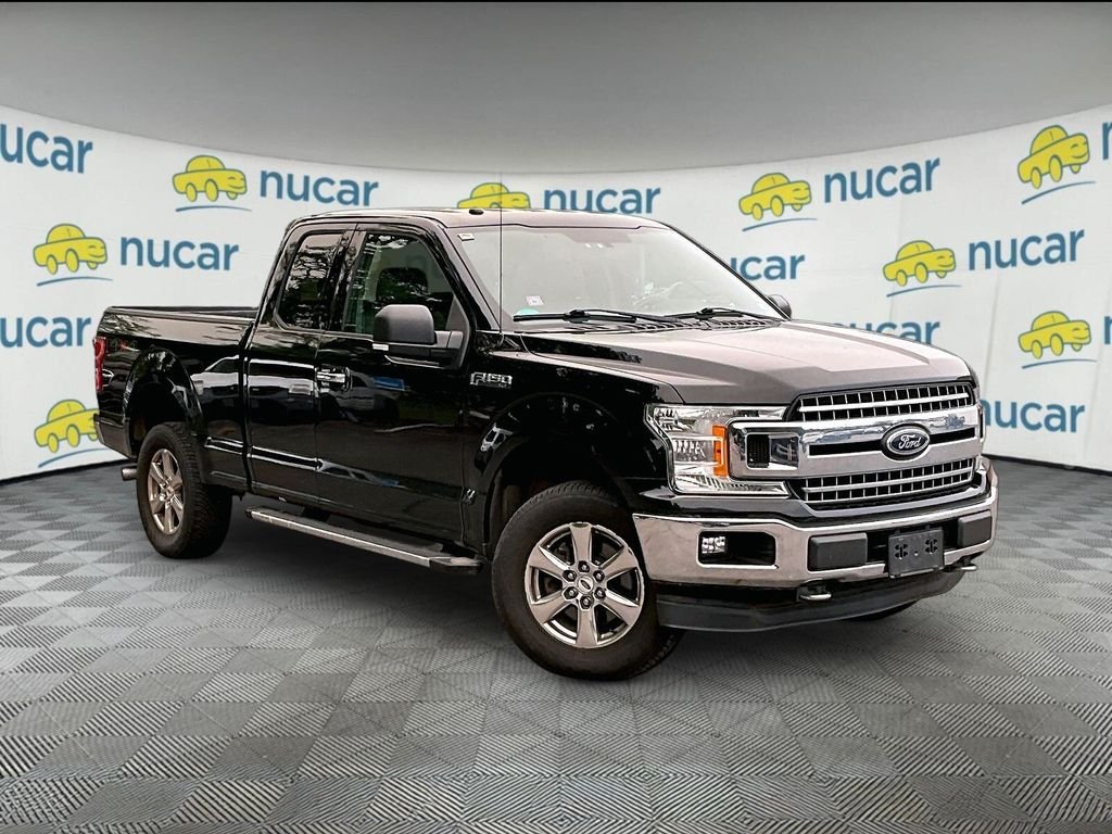 Used 2018 Shadow Black Ford XLT image 1