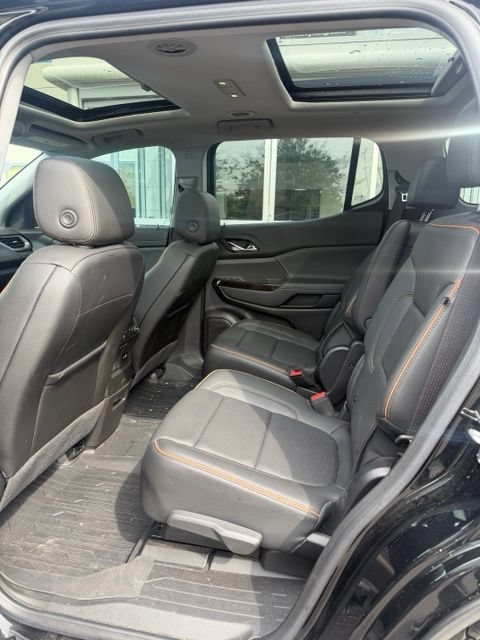 Used 2023 EBONY TWILIGHT METALLIC GMC AT4 image 4