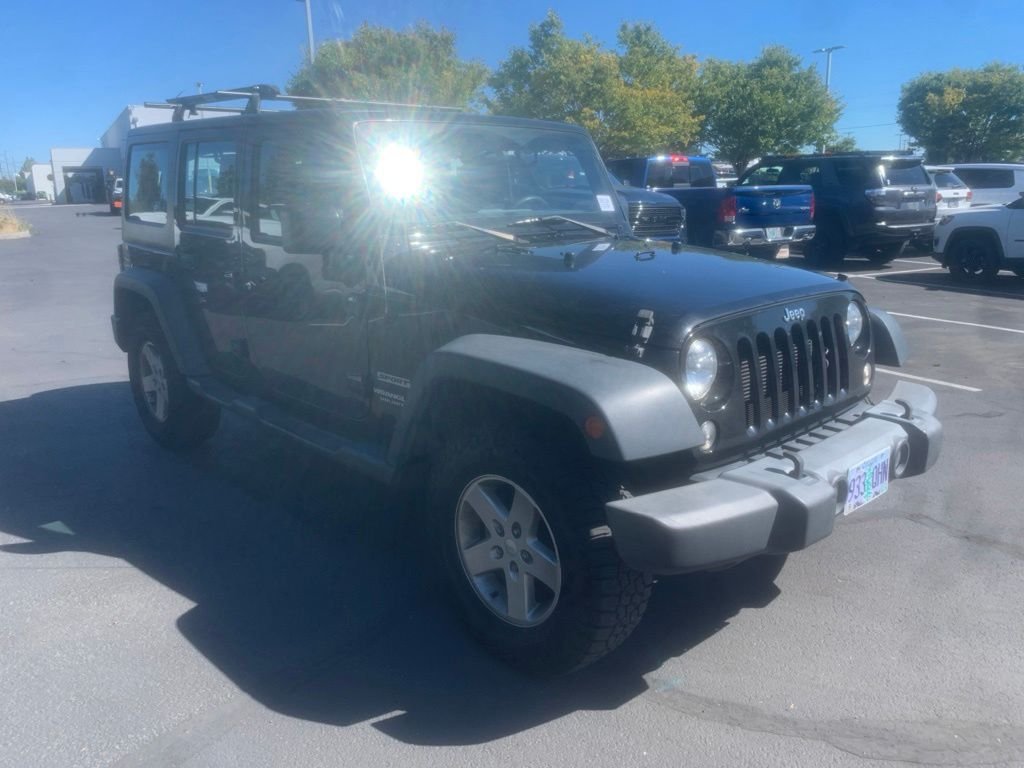 Used 2016 Black Clearcoat Jeep Unlimited Sport image 5