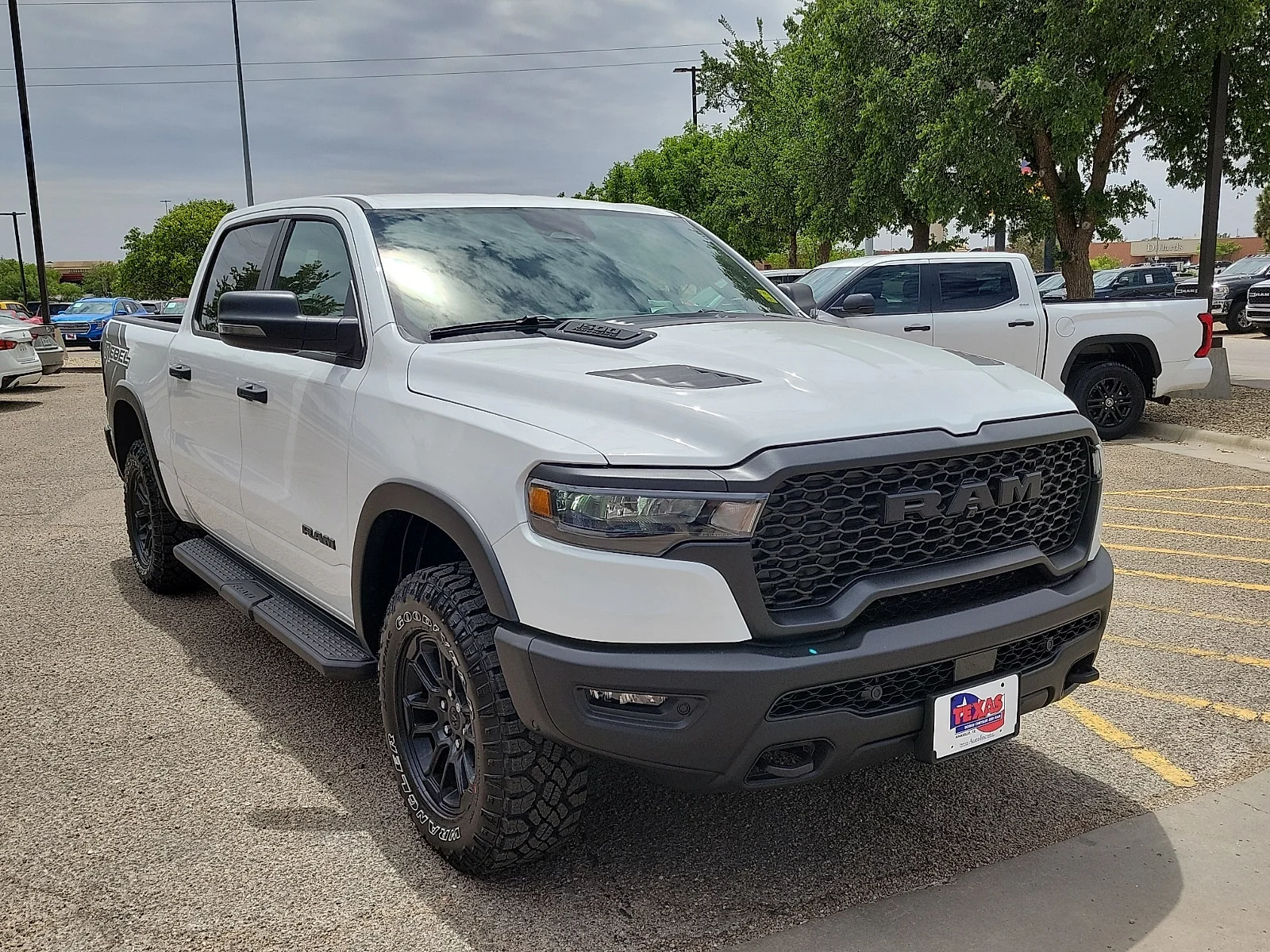 New 2026 PW7 Bright Whit Ram REBEL CREW CAB 4X4 5