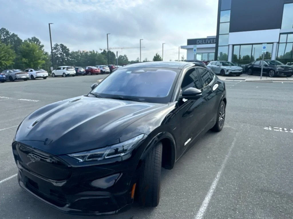Used 2024 Black Ford Premium image 1