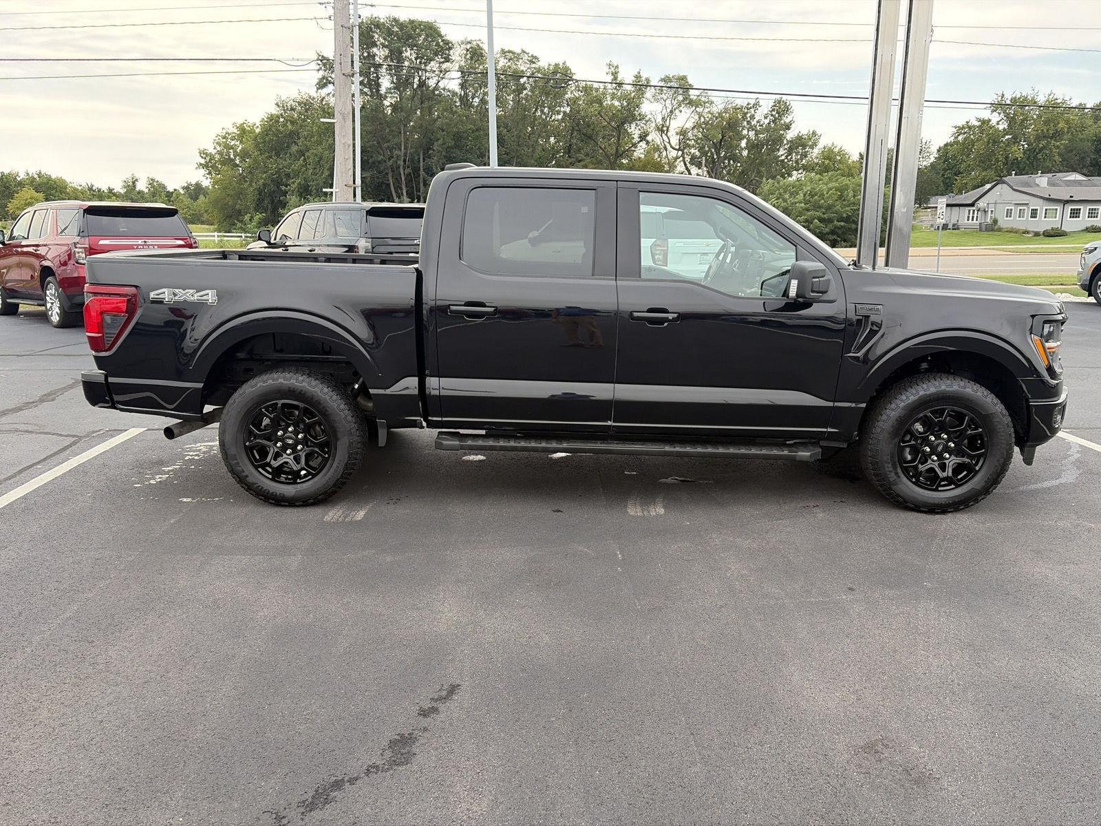 Used 2024 Agate Black Metallic Ford XLT image 2