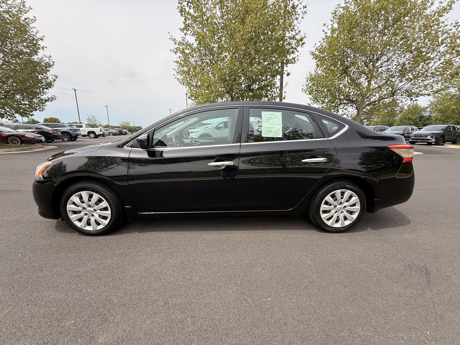 Used 2015 Super Black Nissan S image 8