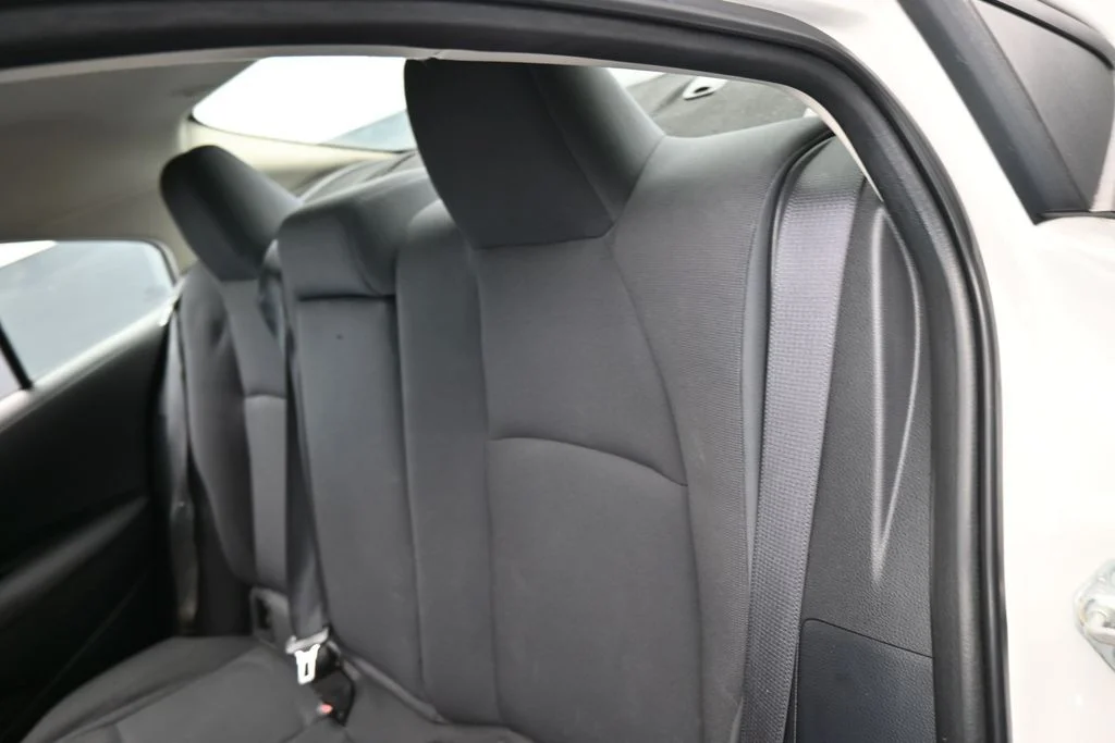 Used 2021 Super White Toyota LE image 25