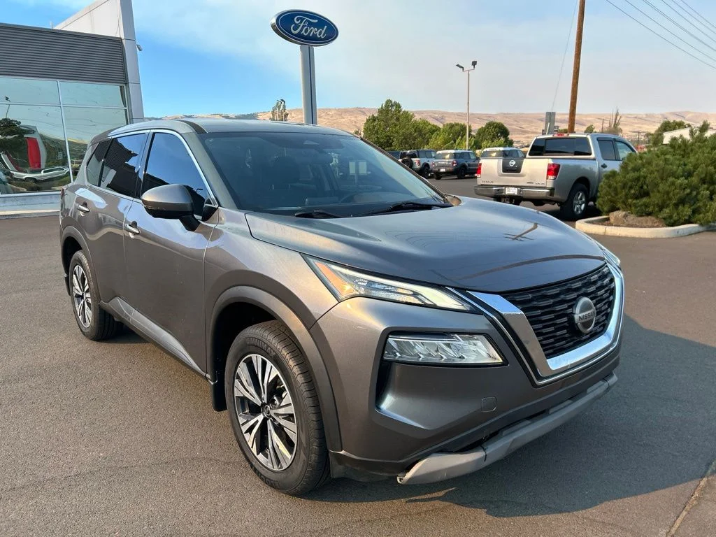 Used 2021 Gun Metallic Nissan SV image 1