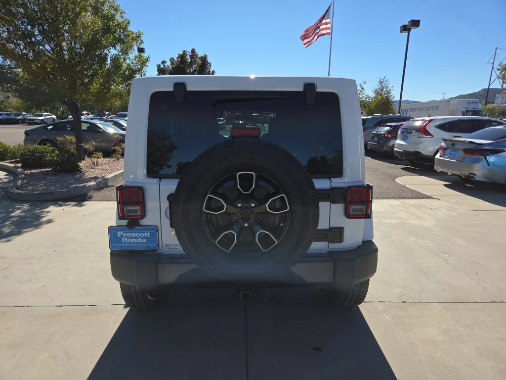 Used 2017 White Jeep Unlimited Sahara image 6