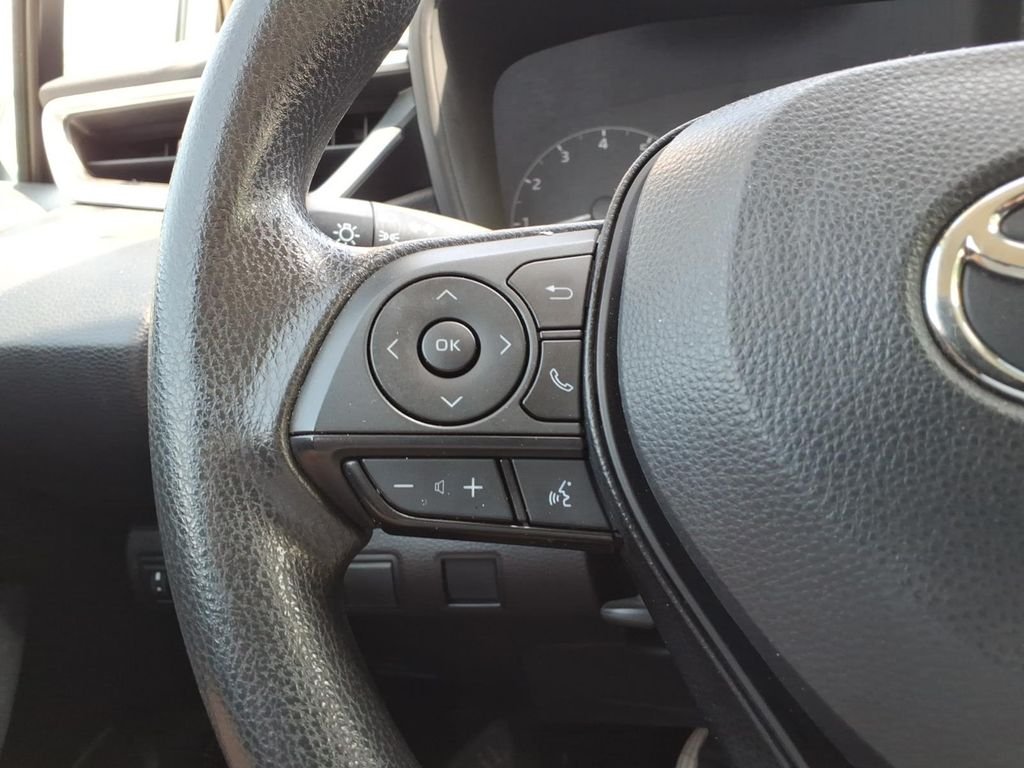 Used 2023 Classic Silver Metallic Toyota LE image 21