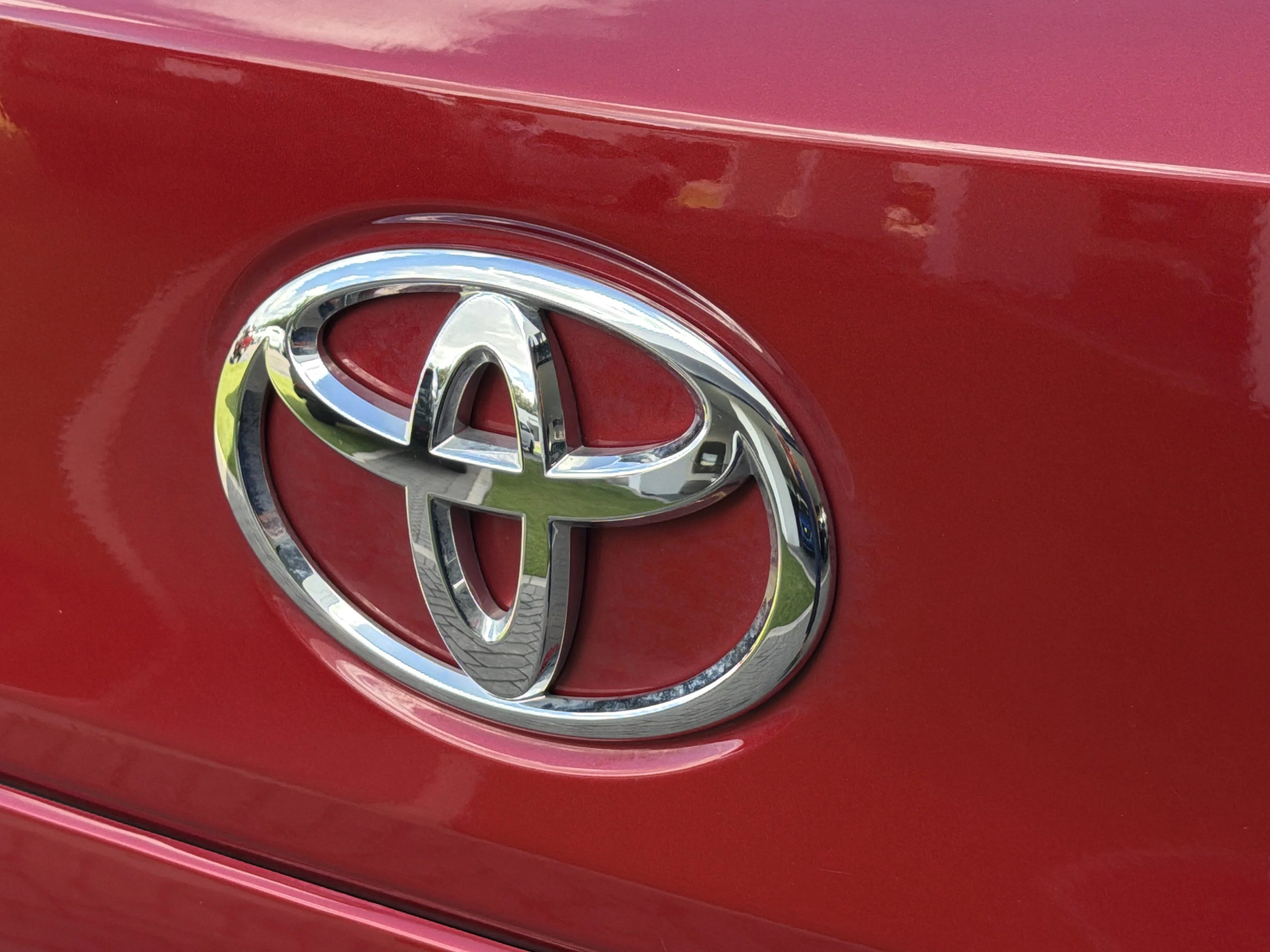 Used 2023 Barcelona Red Metallic Toyota LE image 11