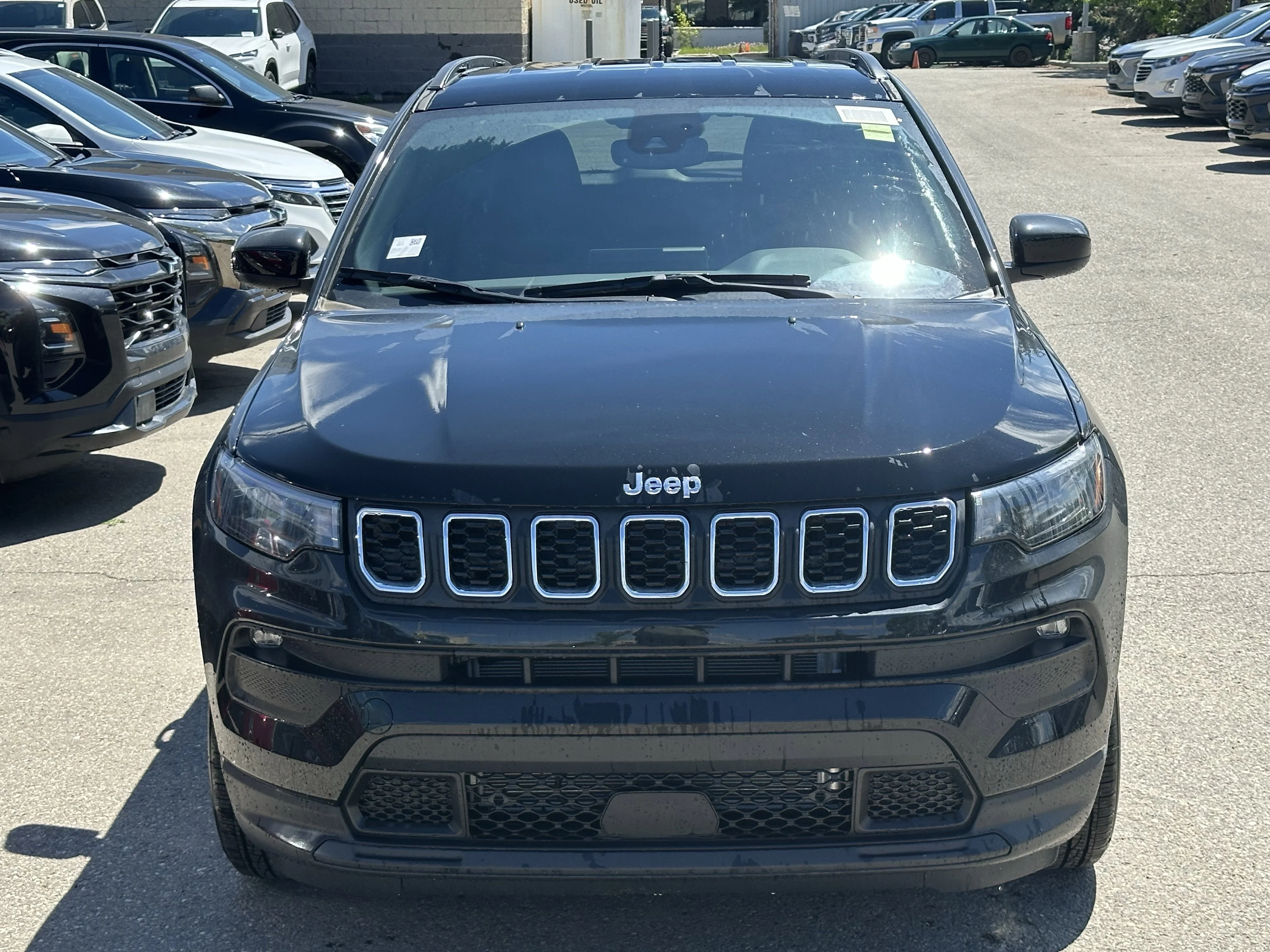 Certified Used 2026 Diamond Black Crystal Pearl Jeep Sport image 2
