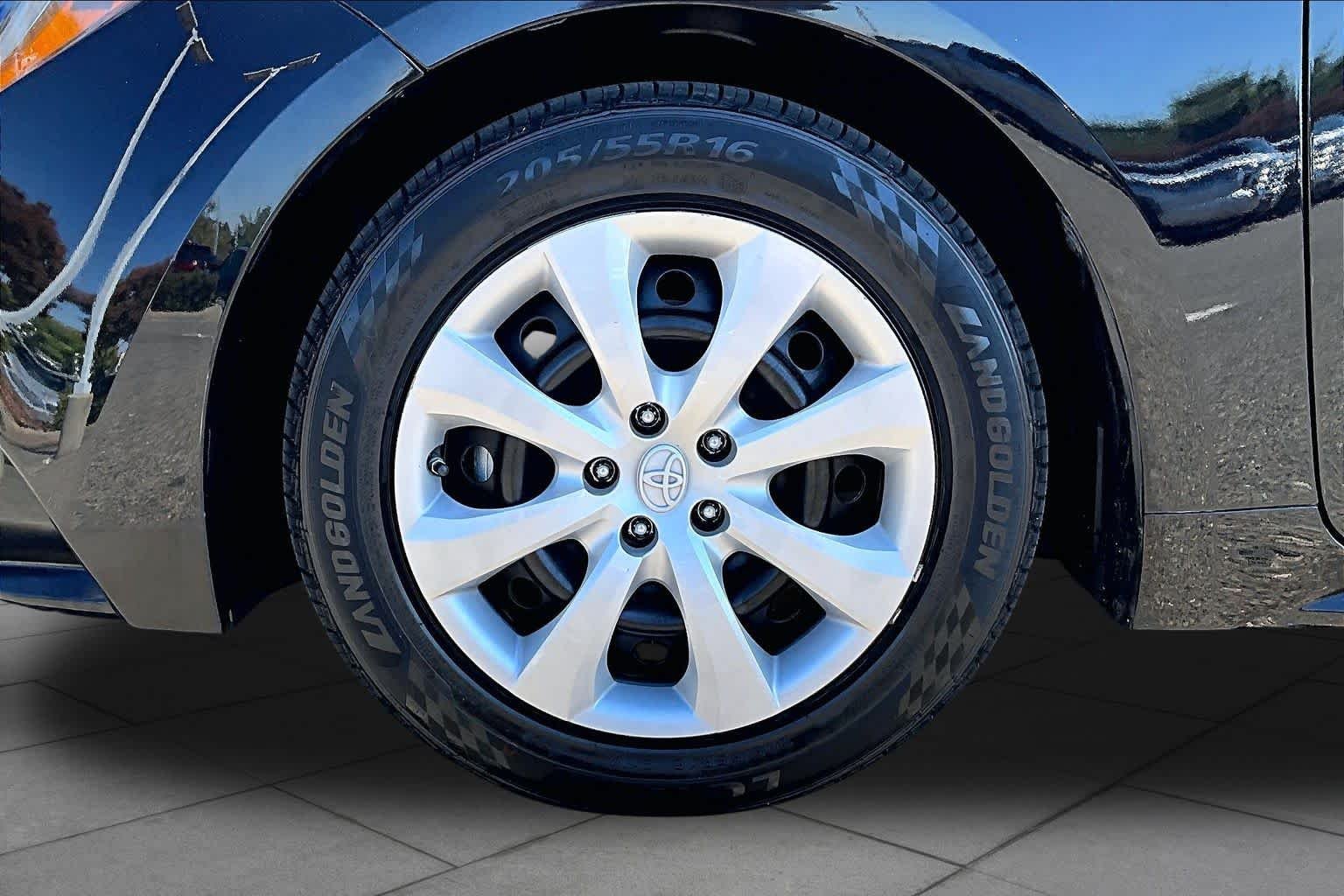 Used 2023 Midnight Black Metallic Toyota LE image 10