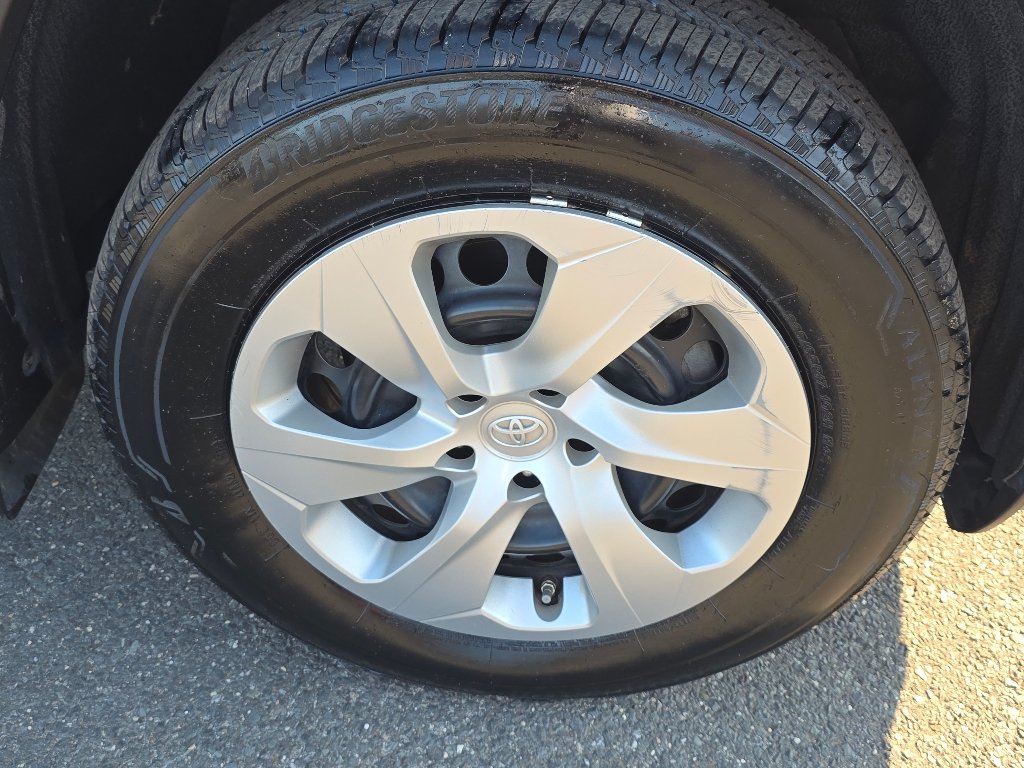 Used 2021 Super White Toyota LE image 15