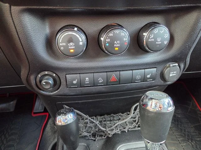 Used 2015 Red Jeep Unlimited Sahara image 25