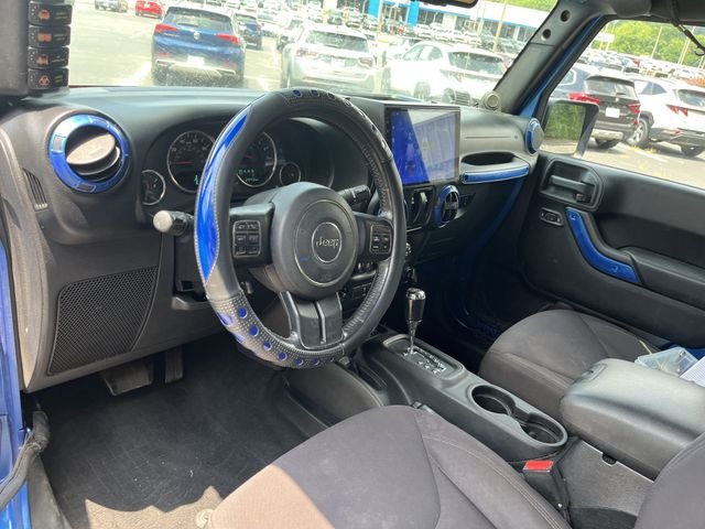 Used 2014 Flame Red Clearcoat Jeep Sport image 12