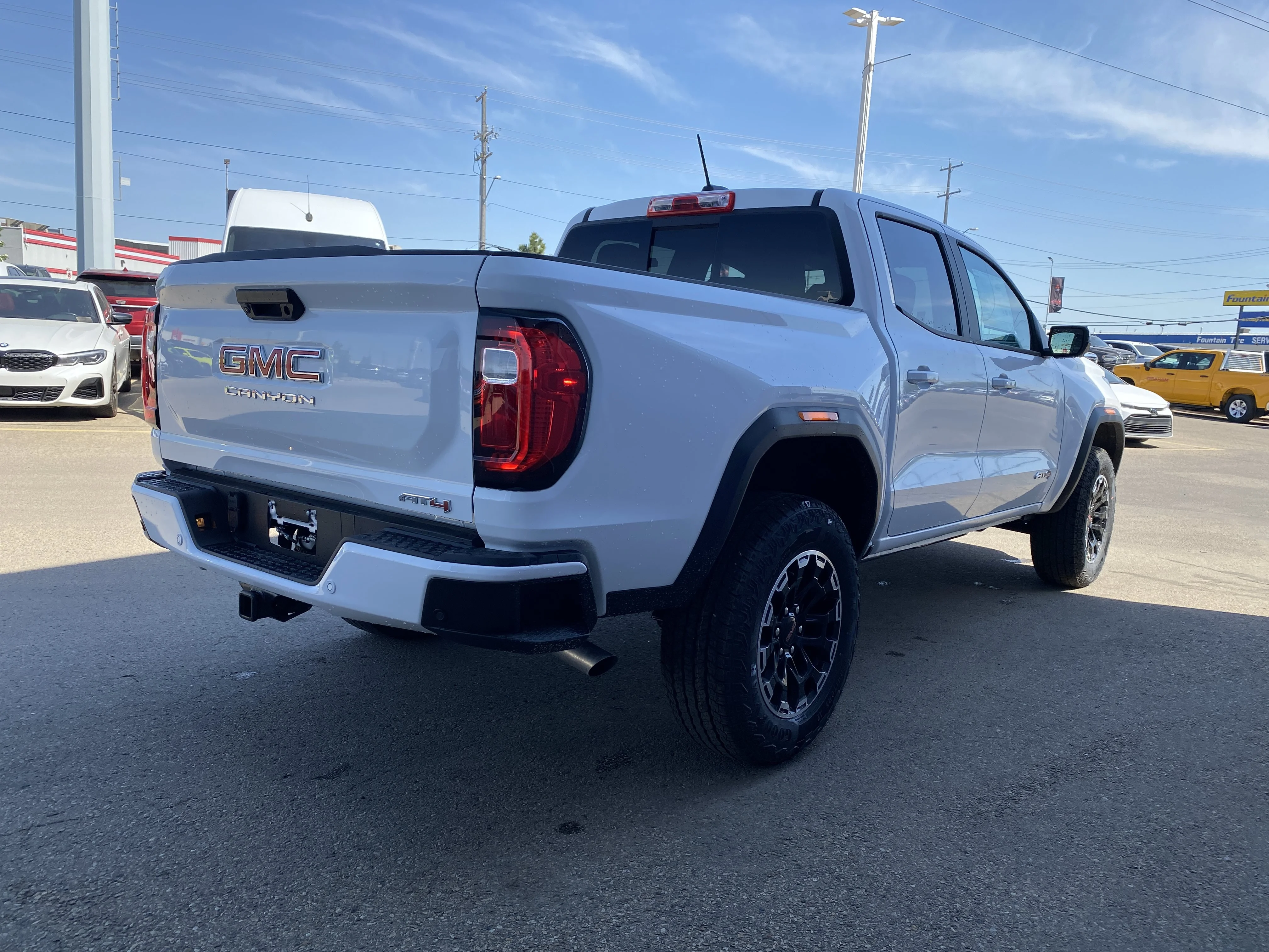 New 2026 Summit White GMC 4WD AT4 image 6