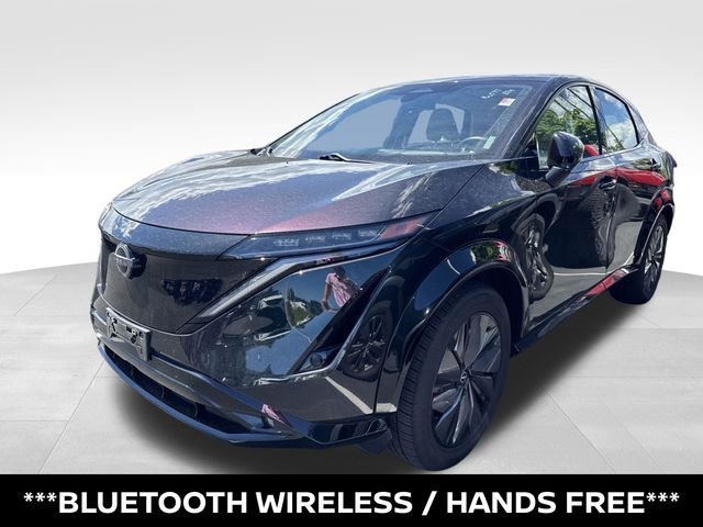 Certified Used 2024 Green Nissan EVOLVE+ e-4ORCE image 3