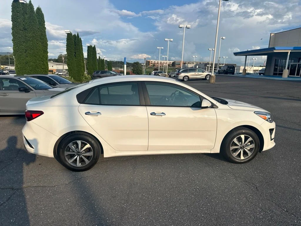 Used 2023 Clear White Kia S image 4