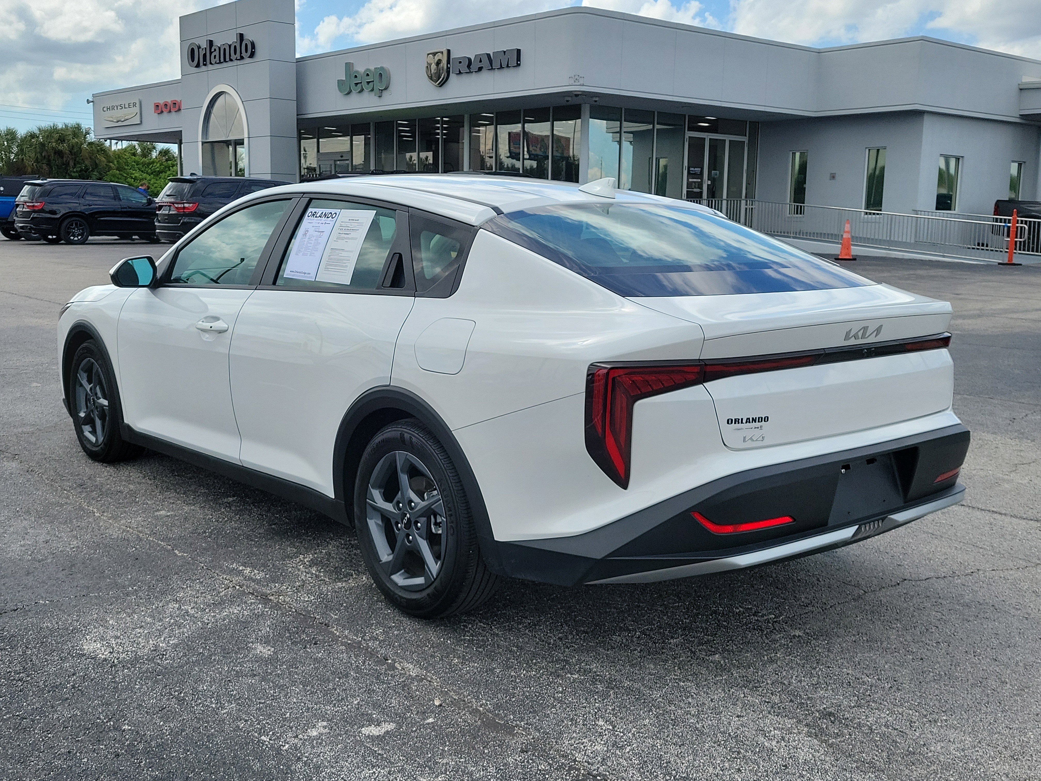 Used 2025 Snow White Pearl Kia LXS image 4