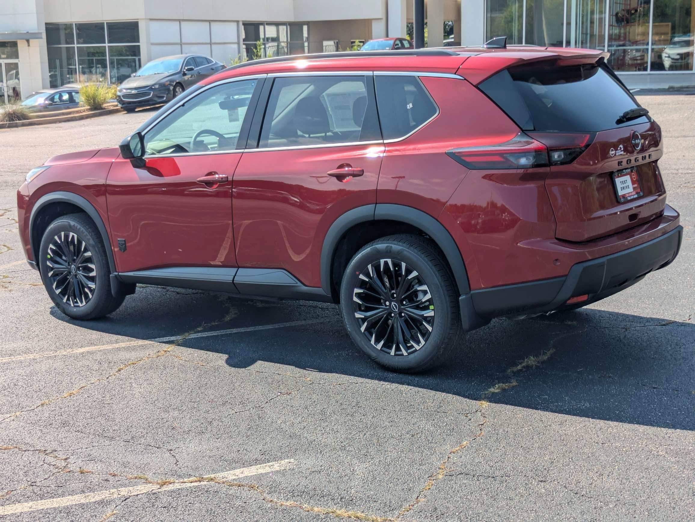 New 2026 Red Nissan Dark Armor image 3