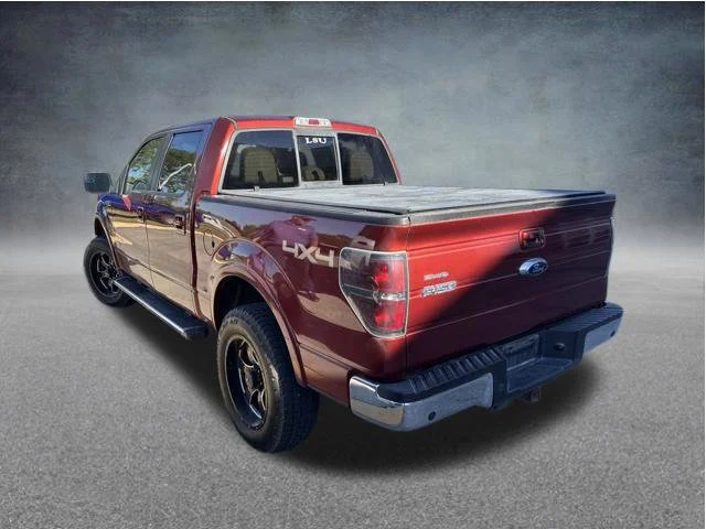 Used 2014 Orange Ford Lariat image 4