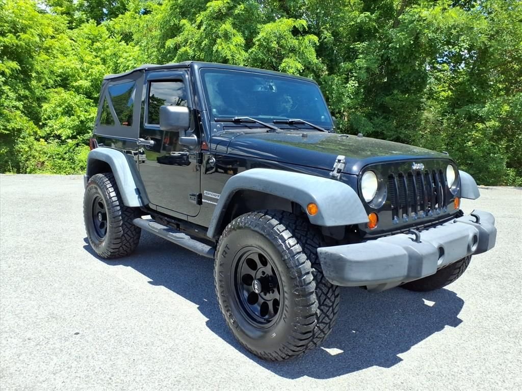 Used 2013 Black Jeep Sport image 8