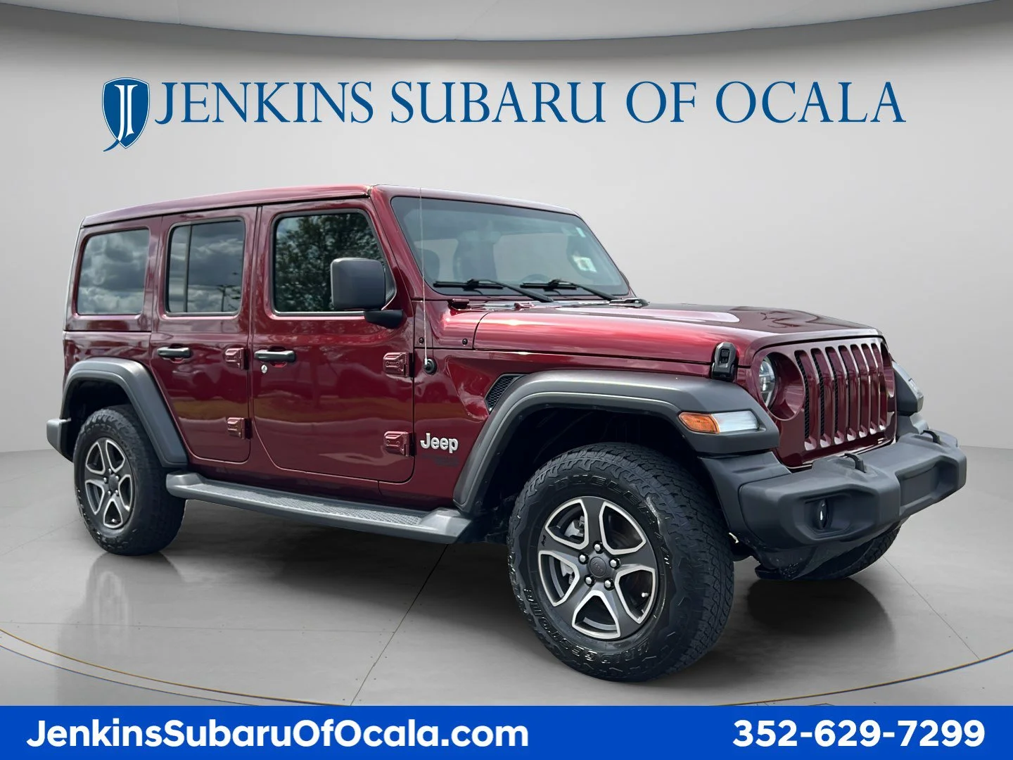 Used 2021 Snazzberry Pearlcoat Jeep Unlimited Sport S image 1