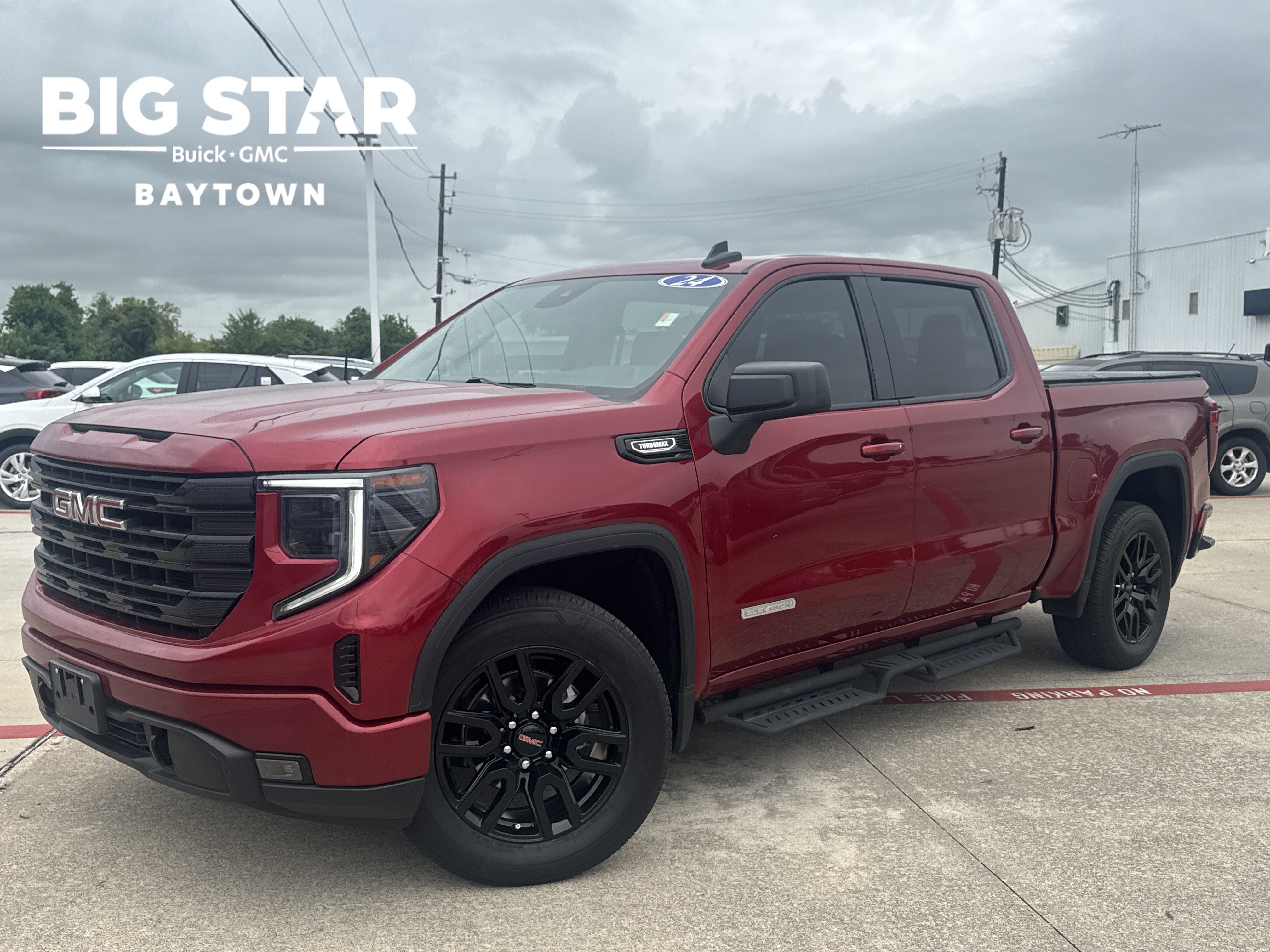 Used 2024 Volcanic Red Tintcoat GMC Elevation image 1