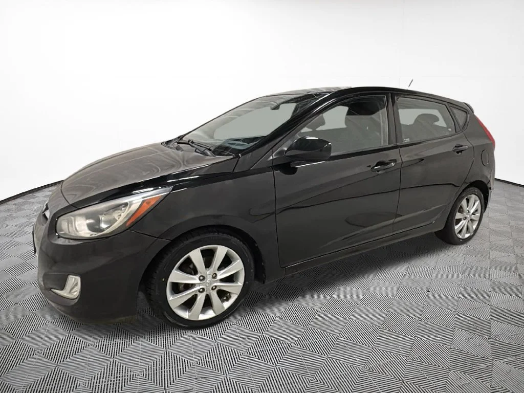 Used 2012 Hyundai Accent SE with VIN KMHCU5AE7CU054641 for sale in Eau Claire, WI