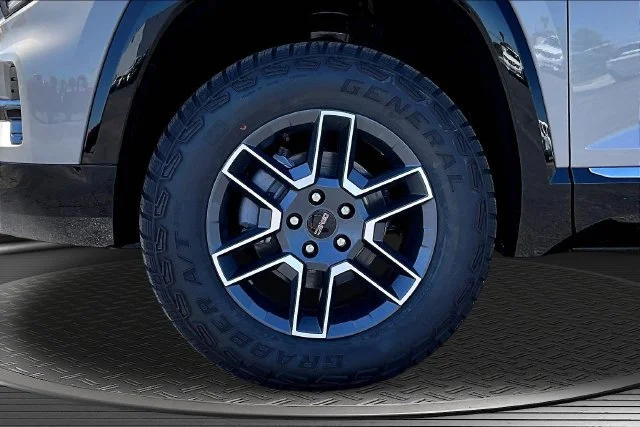 New 2026 Riverstone Metallic GMC AT4 image 13