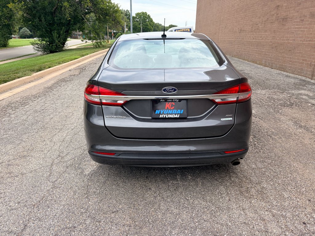Used 2018 Magnetic Metallic Ford SE image 4