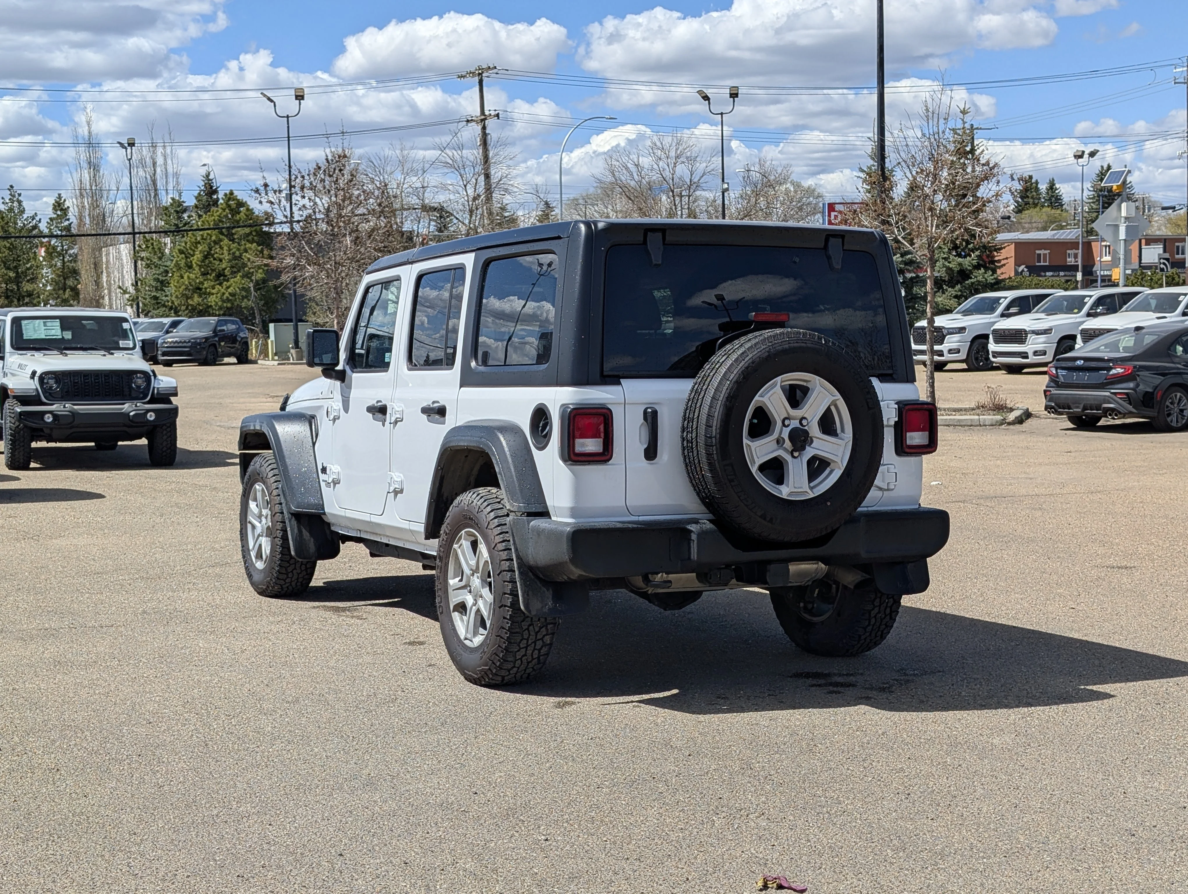 Used 2021 Bright White Jeep Unlimited Sport image 4