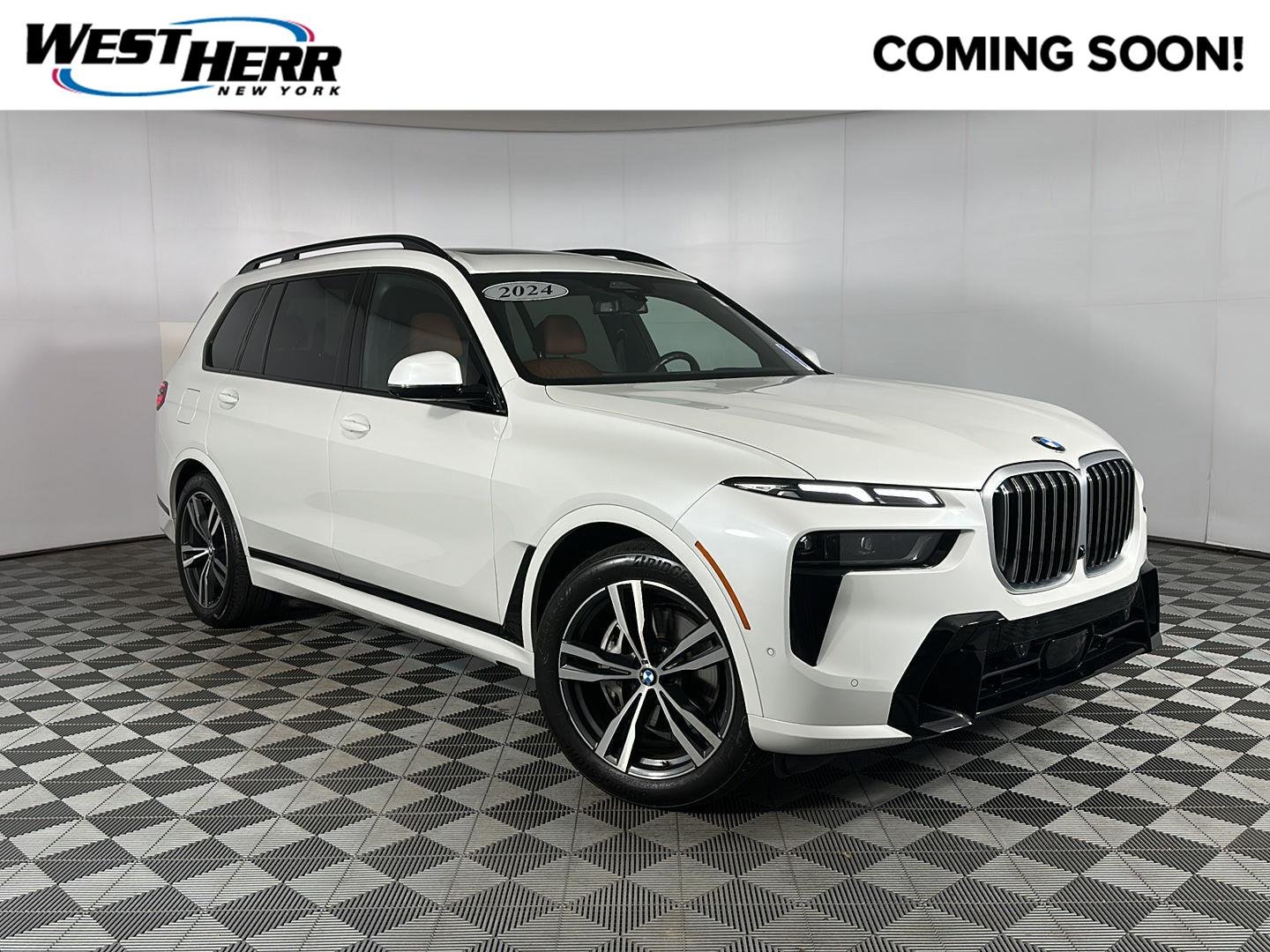 Used 2024 Mineral White Metallic BMW xDrive40i image 1