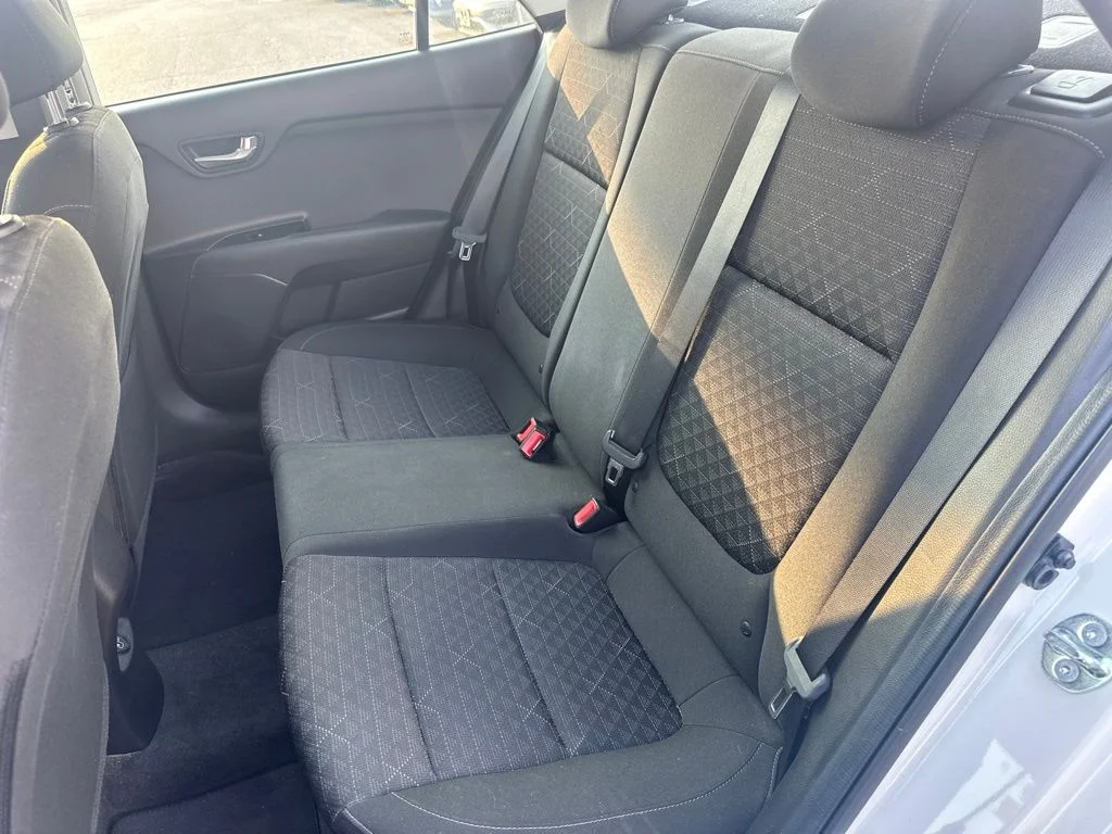 Used 2023 Clear White Kia S image 15